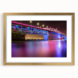 Extra large abstract art print of Auckland's skyline in muted blue and gray tones on a framed canvas.