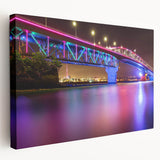 Side view of a stretched canvas depicting the Auckland skyline in muted watercolor tones, suitable for kitchen wall art.