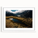 Abstract art print of Canterbury, New Zealand with muted earth tones on a framed white mat, suitable for dining room decor.