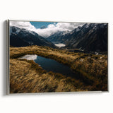 Landscape art painting of Canterbury, New Zealand, featuring vibrant greens and blues on a silver-framed canvas.
