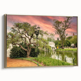 Framed canvas landscape painting of Buenos Aires with vintage poster style in black and gold tones.