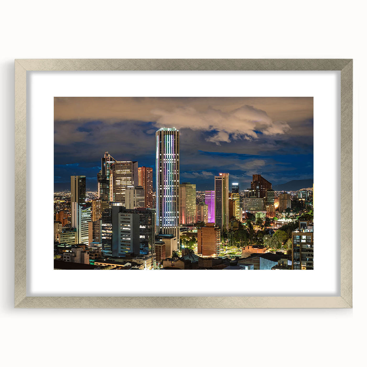 Textured art print of an abstract Colombian landscape in cool blue and green hues, framed with a silver mat.