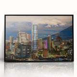 Large abstract wall art depicting a colorful Colombian landscape on a black framed acrylic.