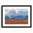 Colorful abstract art print of Denali, Alaska in vibrant hues on a large framed canvas, ideal for living room decor.