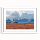 Abstract art print of Denali, Alaska in cool blue and gray tones on a framed white canvas.