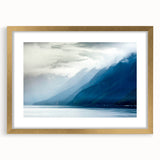 Extra large abstract art print of Alaskan scenery in gold frame, featuring textured brush strokes in cool blues and grays.