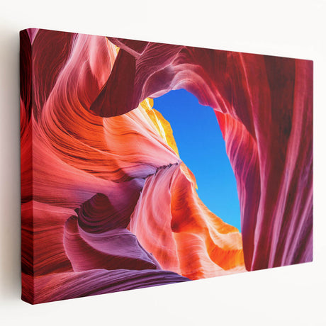 Antelope Canyon in Arizona depicted on a large stretched canvas with warm orange and red tones.