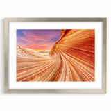 Textured art of Coyote Buttes in Arizona, featuring abstract earth tones on a framed silver mat, ideal for bedroom art.