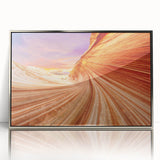 Mid-century modernist art of Coyote Buttes in Arizona, in muted earth tones on a silver-framed acrylic.