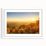 Abstract art print featuring a stylized Arkansas landscape in cool blue and green tones, framed in white.