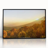 Large abstract wall art depicting Arkansas scenery in muted earth tones, framed in black acrylic.