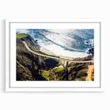 Abstract art print of Big Sur in muted blue and green tones on a framed white matte canvas, ideal for dining room decor.