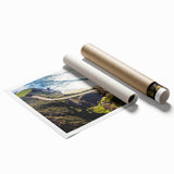 Rolled print of Big Sur coastline with muted blue and green tones, ideal for classy bathroom wall art.