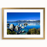 Extra large wall art depicting an abstract textured view of Lake Tahoe in muted blues and greens, framed in gold.