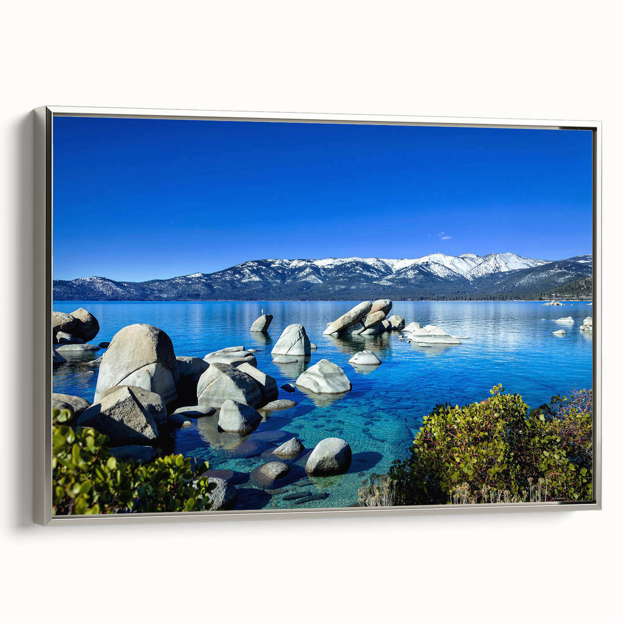 Landscape art painting of Lake Tahoe with a vintage poster style on a framed canvas, featuring a palette of blues and greens.