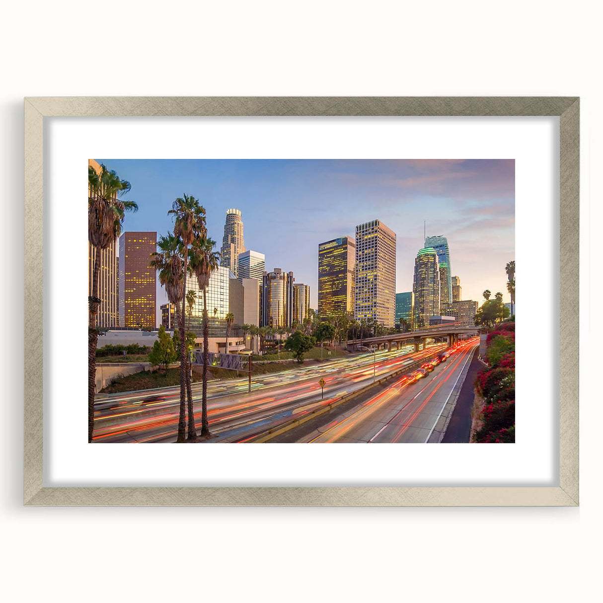 Textured abstract art print depicting Los Angeles skyline in muted gray tones on a silver-framed canvas.