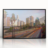 Large abstract wall art featuring a minimalist Los Angeles skyline in muted gray tones on a black framed acrylic print.