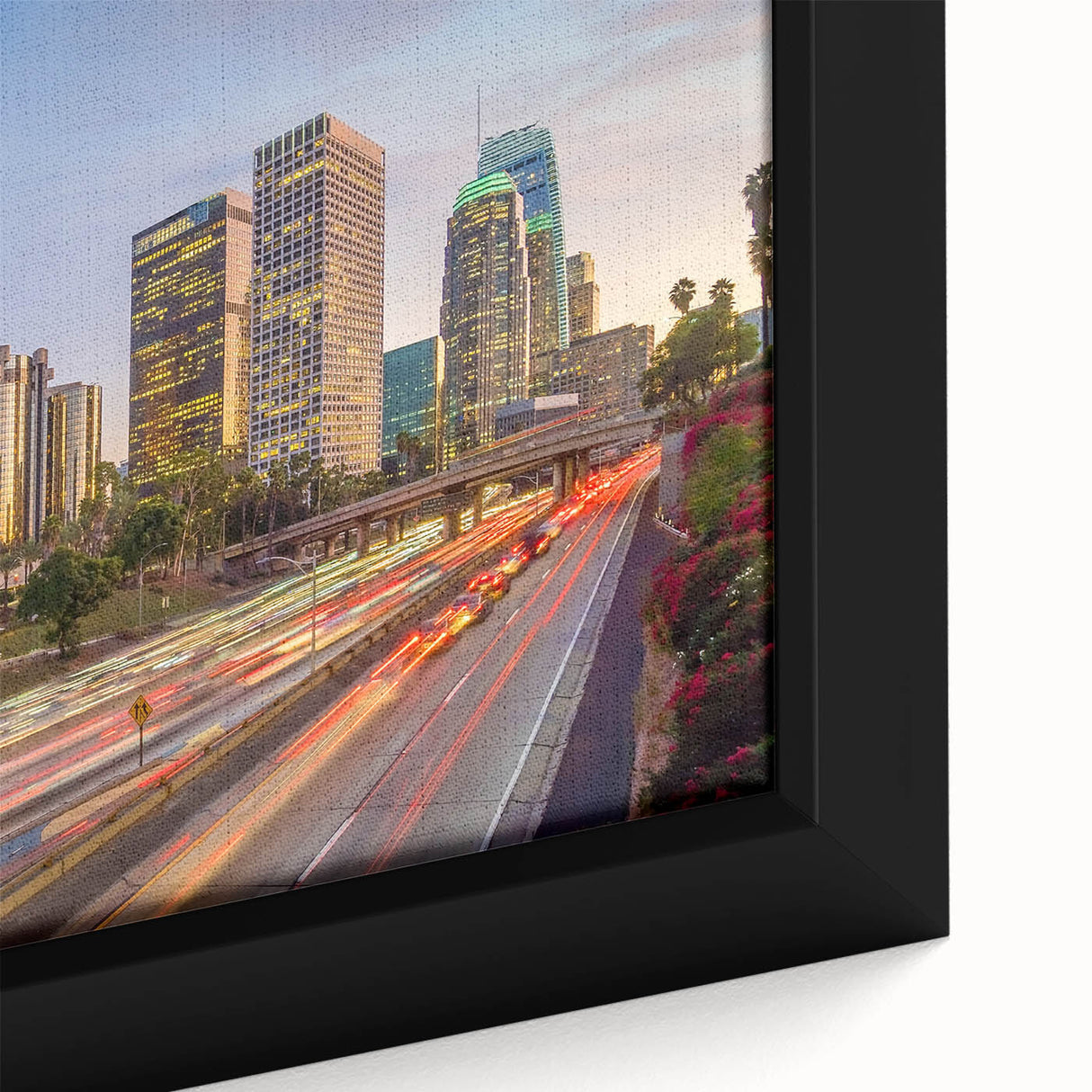 Framed canvas depicting a textured view of the Los Angeles skyline in black with colorful accents.