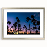 Textured abstract art print of San Diego skyline in muted gray and blue tones, framed in silver, ideal for bedroom ambiance.