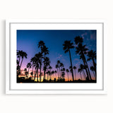 Abstract art print of San Diego skyline in muted blue and gray tones on a white framed canvas.