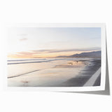 Large rolled print of Santa Barbara scenery with vibrant floral elements on canvas.