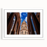 Abstract art print of Santa Cruz coastline in muted blue and green tones on a framed white mat.