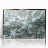 Mid-century modernist art of Vail, Colorado scenery in silver framed acrylic, featuring muted earth tones.