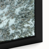 Black wall art featuring a textured depiction of Vail, Colorado, with vibrant colors on a framed canvas.