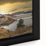 Black wall art featuring a textured depiction of Colorado Springs with vibrant colors on a framed canvas.