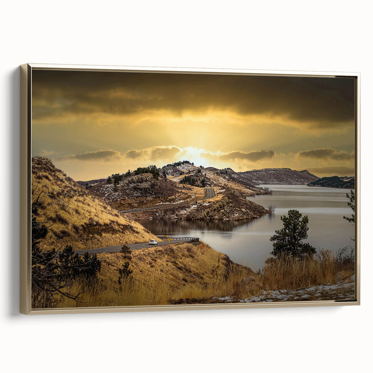 Framed canvas wall art featuring a vintage-style landscape of Colorado Springs in muted gold and black tones.