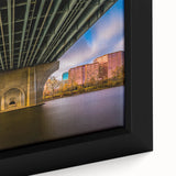 Close-up of textured black wall art depicting a colorful Connecticut scenery on a framed canvas, ideal for living room decor.