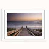 Abstract art print of Daytona scenery in muted blue and gray tones on a white framed poster.
