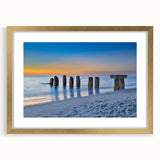 Extra large abstract art print of Florida Keys scenery in muted blues and greens, framed in gold.