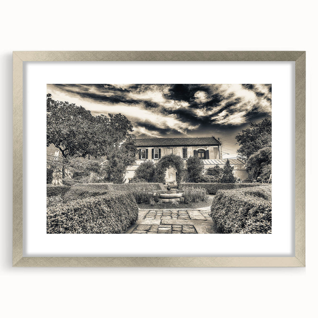 Textured art print of abstract Savannah scenery in muted earth tones on a framed canvas, suitable for bedroom decor.