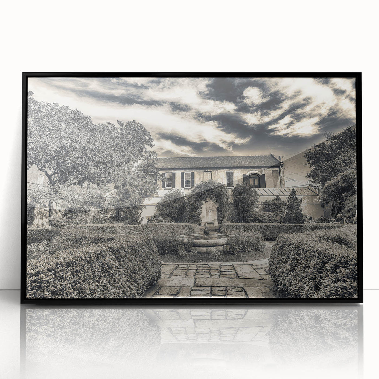 Large abstract wall art of Savannah, Georgia, depicted in muted earth tones on a black framed acrylic print.