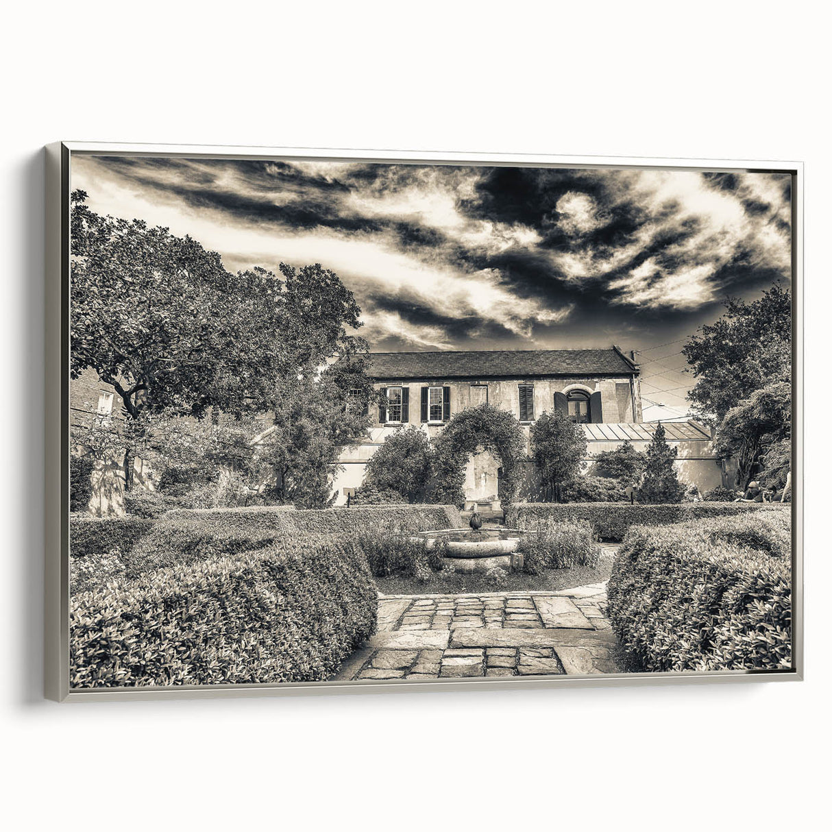 Framed canvas landscape art painting depicting Savannah, Georgia, with muted earth tones and vintage poster style.
