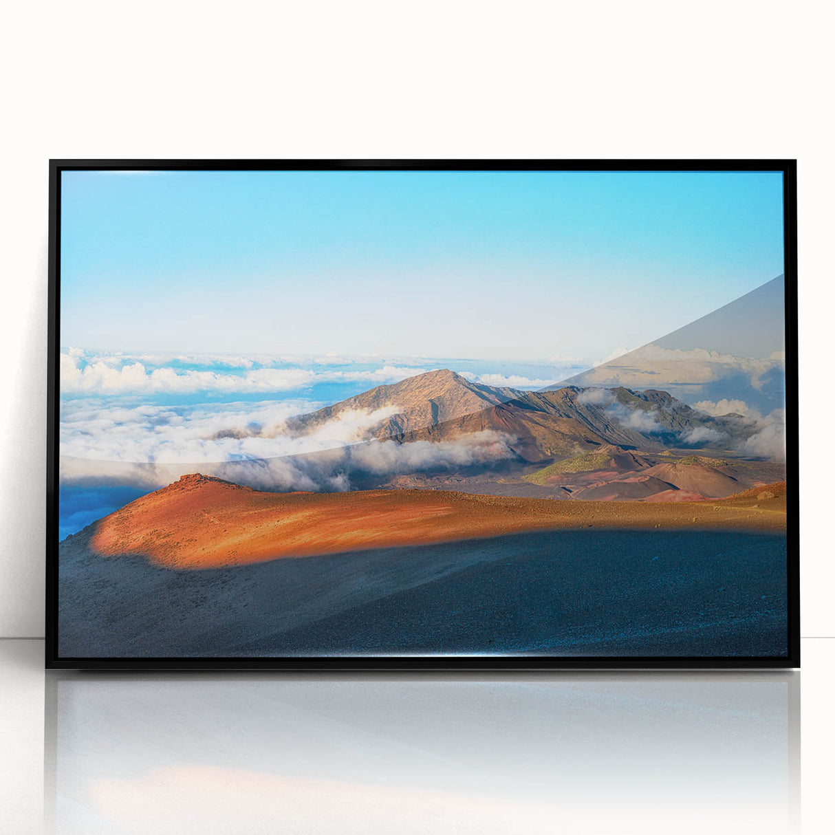 Large abstract wall art depicting Maui scenery in vibrant hues on a black-framed acrylic print.