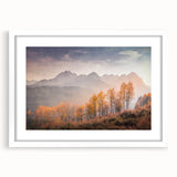 Abstract art print of Idaho scenery in muted earth tones on a white-matted frame, suitable for dining room decor.