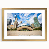 Extra large wall art featuring an abstract textured representation of Chicago's skyline in muted gold and gray tones.