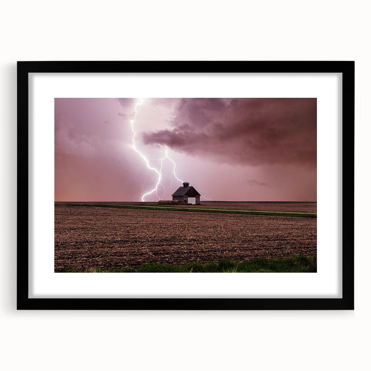 Extra large abstract art print featuring colorful, textured scenery of Iowa on a framed black mat.
