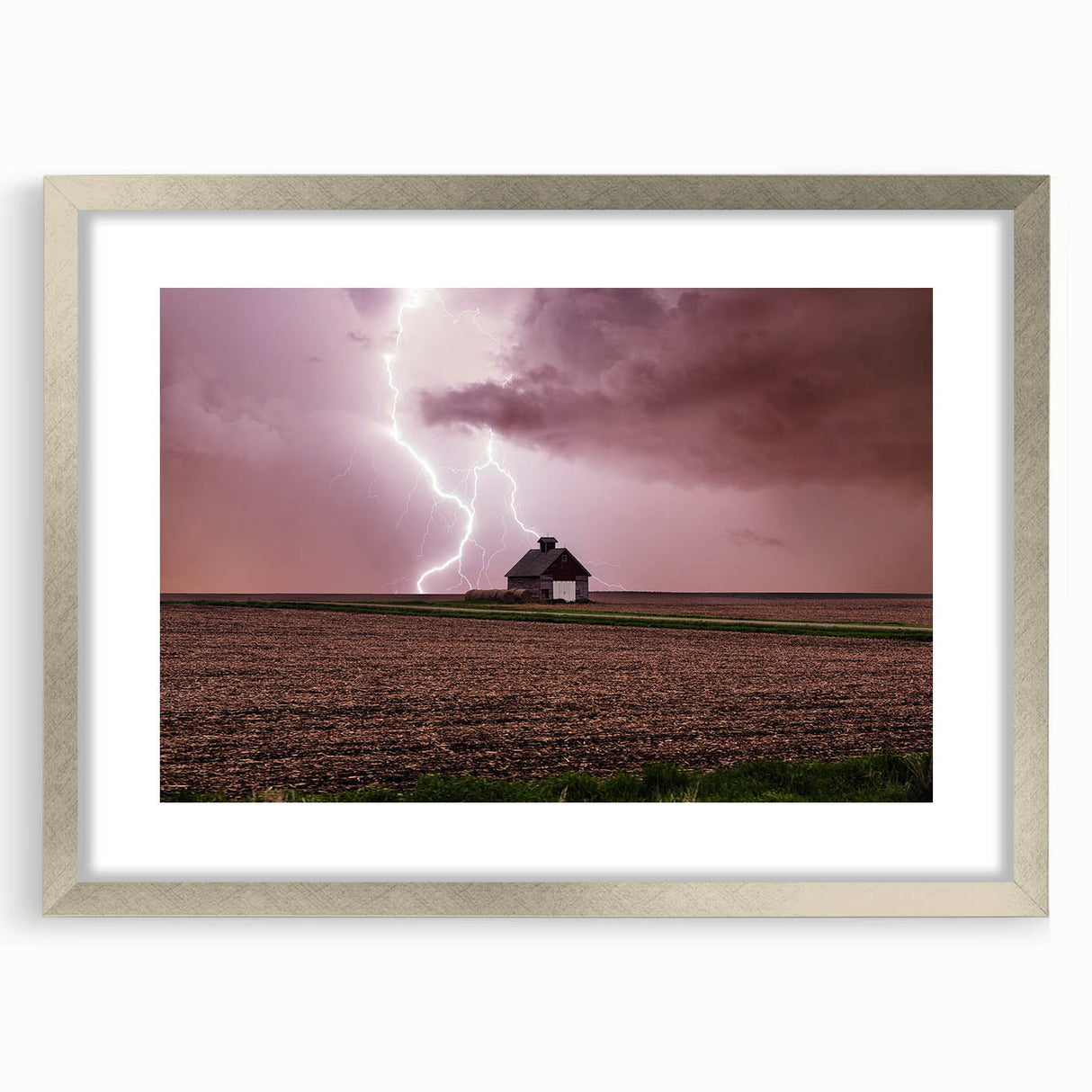 Textured abstract art print of Iowa scenery in muted earth tones, framed in silver, ideal for bedroom art decor.