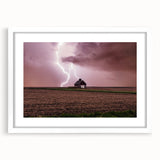 Abstract art print of Iowa scenery in muted earth tones on a framed white mat, suitable for dining room decor.