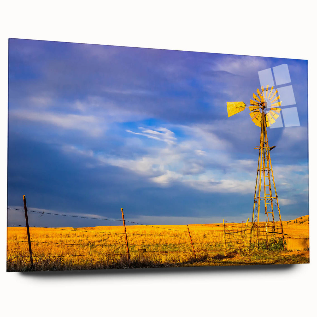 Large abstract wall art featuring vibrant hues of blue and orange on acrylic glass.