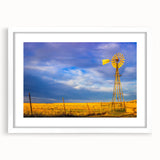 Abstract art print of Kansas scenery in muted earth tones on a white framed canvas, suitable for dining room decor.
