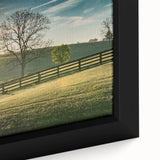 Close-up of textured black wall art featuring a vibrant Kentucky landscape on a framed canvas, ideal for living room decor.