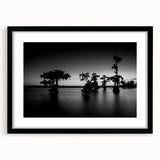 Extra large abstract art print of a textured, colorful Louisiana scenery in a black frame, ideal for living room decor.