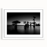 Abstract art print of Louisiana scenery in muted earth tones on a white-framed mat.
