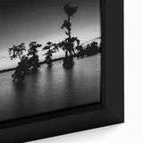Extra large framed canvas of a textured Louisiana landscape in black with colorful accents, ideal for living room decor.