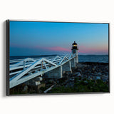 Black and white wall art featuring a vintage poster-style landscape of Maine on a framed canvas, suitable for bedroom decor.