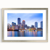 Textured abstract art print of Boston skyline in muted gray and blue shades, framed in silver, ideal for bedroom wall decor.